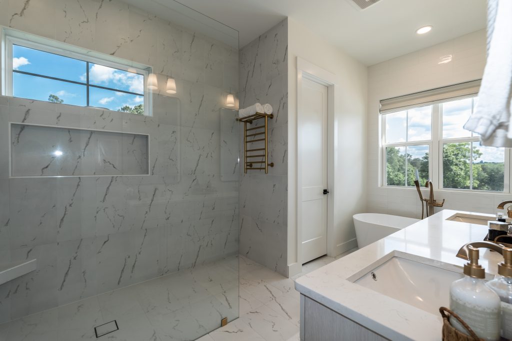 master bathroom with beautiful tiles and natural lighting