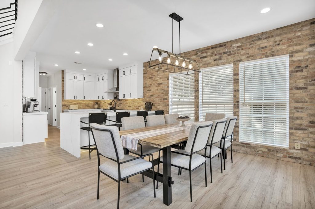 dining room with a dining table and overhead lighting