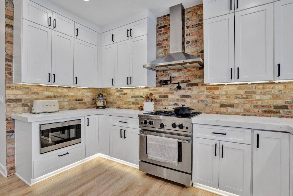 remodeled farmhouse kitchen with under cabinet lighting